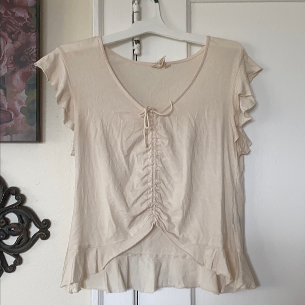 Cream colored top.